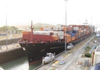 Photo of a large barge in the panama canal