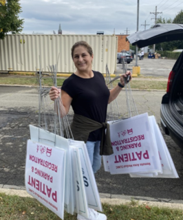 Jaimee with parking signs