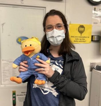 Caitlin Wolf with Duck Toy