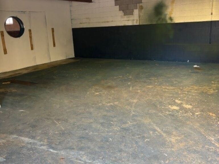 Area Next to Front Garage Bay