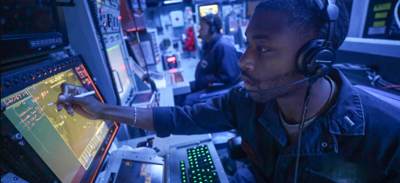 Sailor Using Display on Ship Non Identifiable