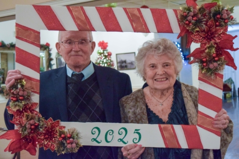 Bob Olson and Rae Johnson frame