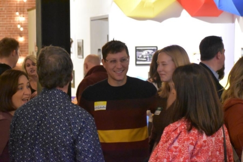 Friendsgiving 2025 group of people talking