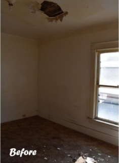 Corner of room with messy floor