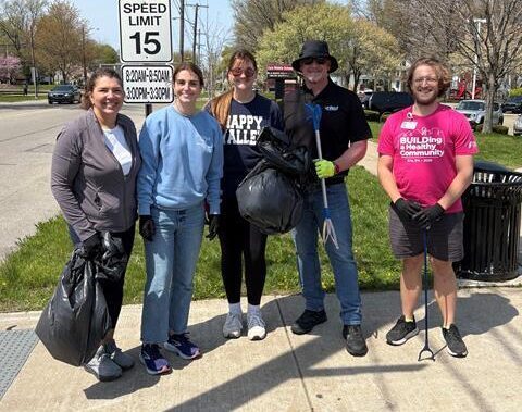 HHF team smiling trash pickup