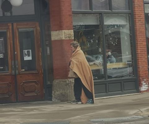 Raymond on a sidewalk in Erie Pa