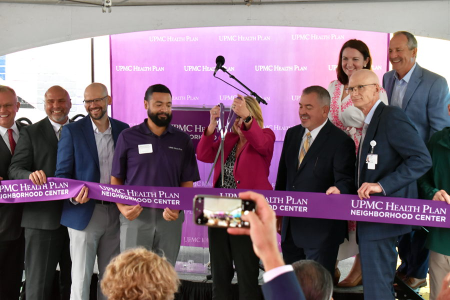 Ribbon cuttng neighborhood centr