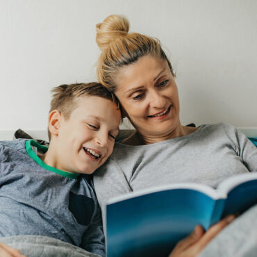 Mom reading with son