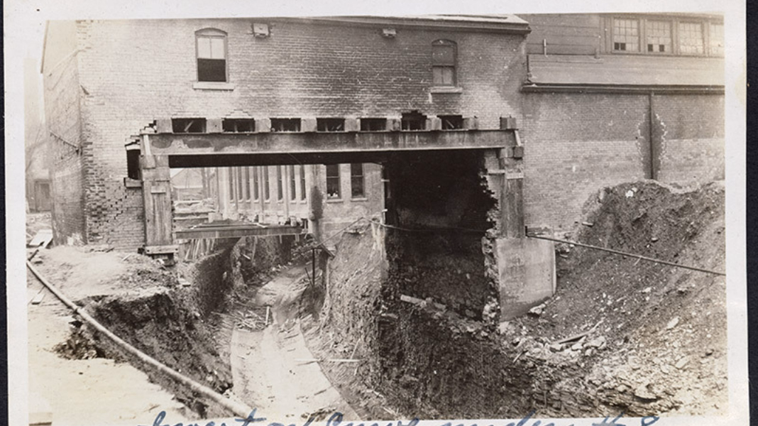 Invert on curve under building 8