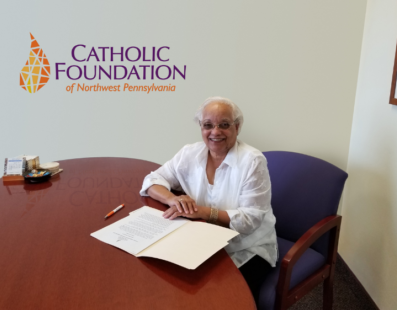 Edith Benson signing the Social Justice Endowment