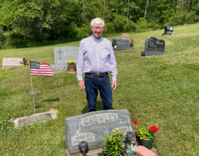 Bob Crowley visits the resting place of his parents.
