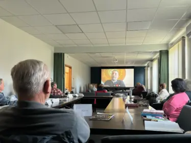 A bible study session takes advantage of the new projector and screen