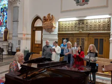 Christine Pawlowski and the St. Andrew Parish choir
