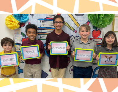 Students from Saint John Paul II Elementary School, Hermitage, PA, show off their iPads with a message for the Catholic Foundation.
