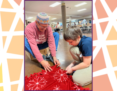 Part of the service day was creating fleece blankets for new refugee families.