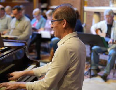 Father Ricky Manalo rehearsing at Saint Joseph Parish