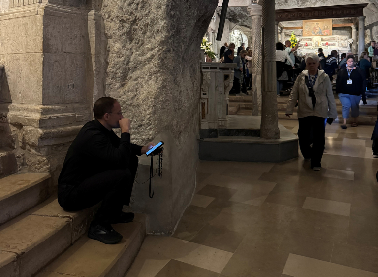 Louis Fr Leading Prayer St Michael Cave