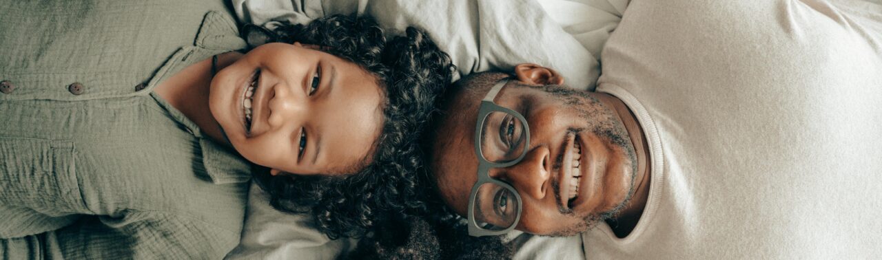 Family of two smiling
